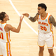 Trae Young and John Collins will continue to be teammates.